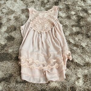 Baby pink sleeveless shirt. Size: Womens medium